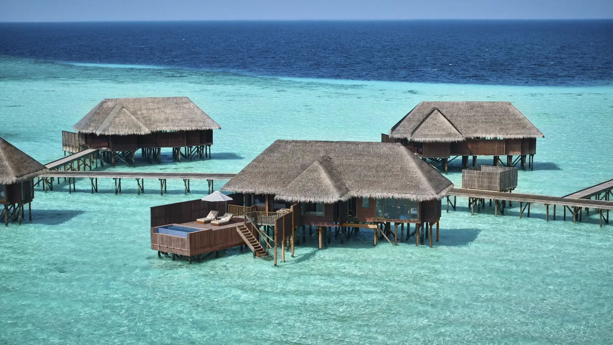 Aerial view of overwater villas at Conrad Maldives Rangali Island